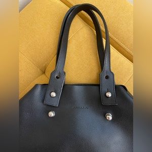 Light and flexible handy bag